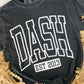 Black t-shirt with 'DASH EST 2013' text on a textured surface