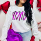 Woman wearing a white sweatshirt with purple text, holding a purple heart-shaped balloon, standing against a wall with red heart decorations.