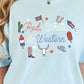 Light blue t-shirt with 'Red, White & Western' text and graphics worn by a person.