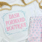 White shirt with 'Dash Forward Boutique' text and pink floral pants on a white background