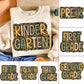 Children's sweatshirt with 'Kindergarten' text and grade level stickers displayed.
