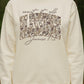 White sweatshirt with Count it all blessings james 1:2 text camo design against a natural background