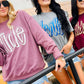 Three women wearing hoodies with 'Wilde' printed on them, standing outdoors.