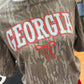 Mossy Oak Bottomland Camouflage shirt with 'Georgia' text on a mannequin