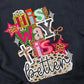 Black sweatshirt with colorful His Way is Better text design with cross and bow on a plain black background