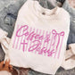 White sweatshirt with 'Coffee & Jesus' text in pink on a denim surface
