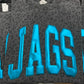 Gray sweatshirt with blue 'JAGS' Puff vinyl on a black leopard tee background