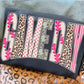 Text 'GAMEDAY' with leopard print and polka dot patterns on a black background.