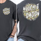 A graphic tee with 'HOOCHIE DADDY' printed on the front and a camouflage pattern on the back, available in a color named 'Pepper'.