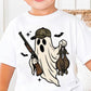 Child wearing a white t-shirt with a camo ghost holding a gun and two ducks design.